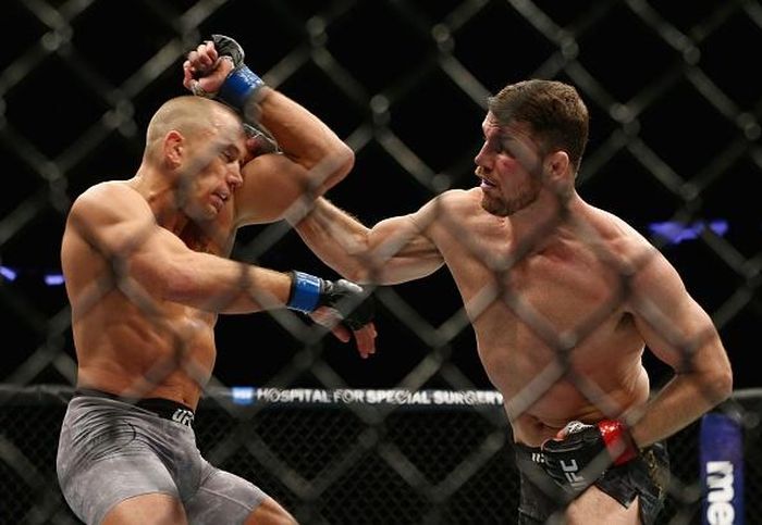 Bisping kéo thế trận về cân bằng trong hiệp 2. Liên tiếp những tình huống trao đổi đòn đến từ hai võ sĩ. Bisping tung cú móc phải uy lực. Ngay lập tức, "GSP" trả lời bằng một tình huống vật thành công nhưng không thể tận dụng để thực hiện đòn khóa.