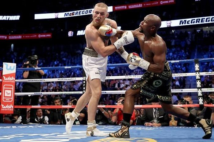 McGregor thất bại trước Mayweather nhưng "thắng" được 120 triệu USD. Ảnh: Getty Images.
