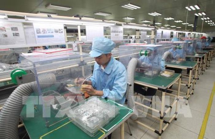 Tăng trưởng kinh tế khởi sắc. Ảnh minh họa: Trần Việt/TTXVN