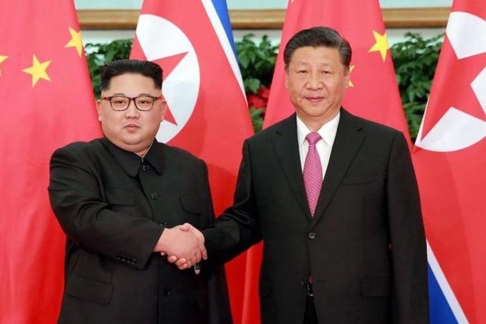 Chủ tịch Trung Quốc Tập Cận Bình và nhà lãnh đạo Triều Tiên Kim Jong-un.