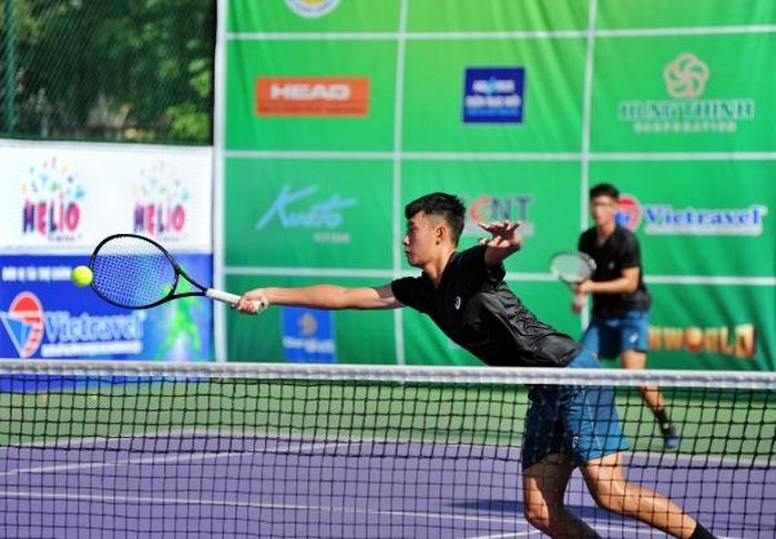 Hai tay vợt của đoàn Hà Nội, Thái Nam và Hoàng Minh.
