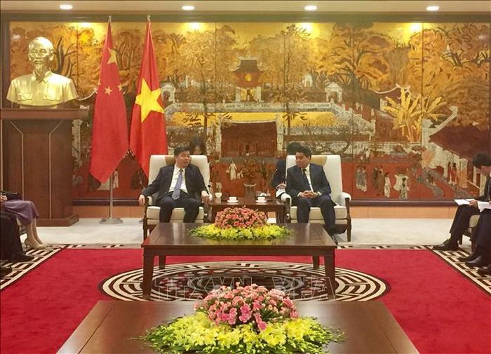 Ngày 27/8/2019, tại Hà Nội, Chủ tịch UBND thành phố Hà Nội Nguyễn Đức Chung làm việc với Phó Tỉnh trưởng tỉnh Quảng Đông (Trung Quốc) Âu Dương Vệ Dân. Ảnh: Nguyễn Thắng/TTXVN