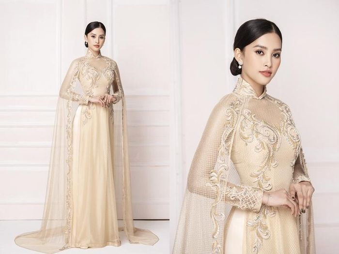 Hoa hậu Tiểu Vy đầy sang trọng với áo dài kết hợp cùng áo choàng ren in hoạt tiết.