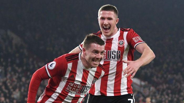 John Fleck ăn mừng bàn thắng vào lưới MU
