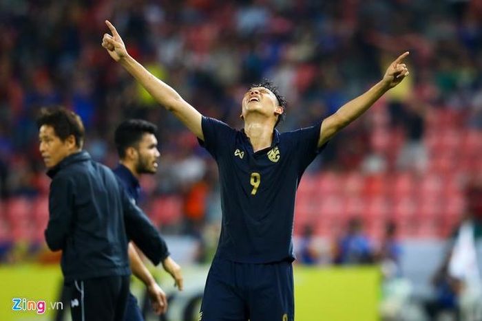  Cầu thủ U23 Thái Lan ăn mừng sau trận hòa U23 Iraq, kết quả đưa Thái Lan lần đầu tiên qua vòng bảng U23 châu Á. Ảnh: Minh Chiến. 