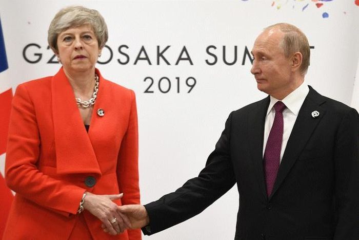 Thủ tướng Anh Theresa May và Tổng thống Nga Vladimir Putin trong cuộc họp tại Hội nghị thượng đỉnh G20 lần thứ 14 ở Osaka. Ngày 28/6/2019. (Ảnh: PA)