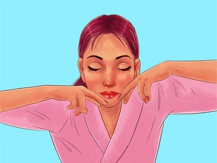 Bước 5: Dùng mặt trên ngón trỏ và ngón giữa vuốt ngược từ vùng cằm lên hai bên má.