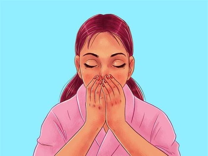 Bước 2: Xoa hai lòng bàn tay vào nhau để làm nóng tay. Nhắm mắt lại, đặt tay lên mũi, má, trán và cằm để thư giãn toàn bộ khuôn mặt.