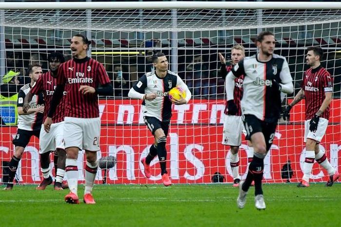 Ronaldo giữ lại trận hòa cho Juventus trước Milan của Zlatan Ibrahimovic. Ảnh: Getty.