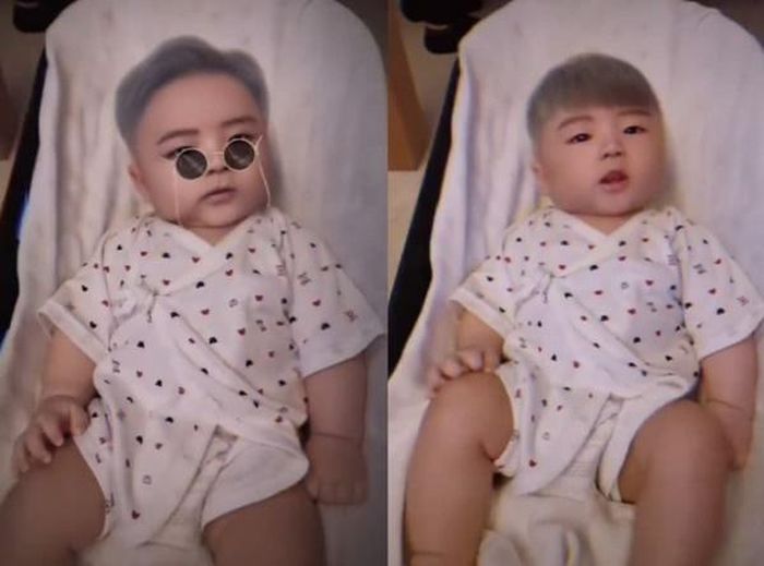 Cậu nhóc được chụp hình với sticker đáng yêu, khuôn miệng đáng yêu luôn chúm chím.
