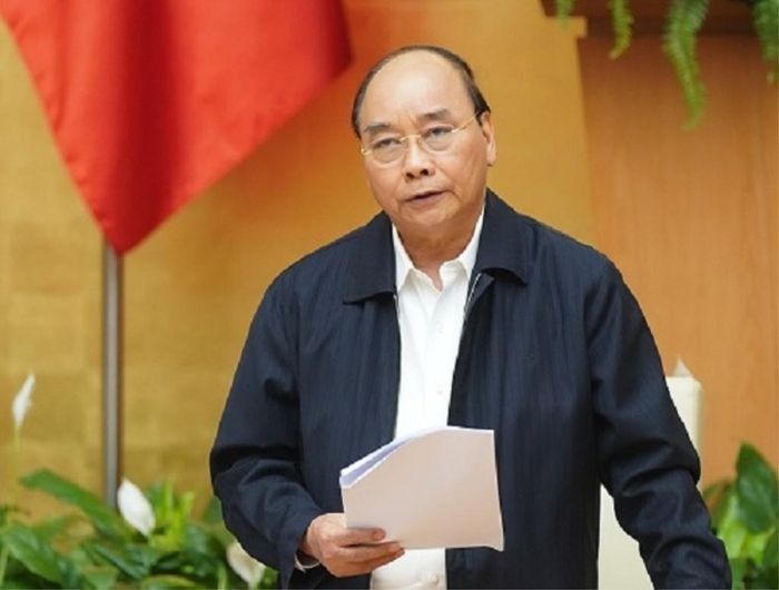  Thủ tướng Nguyễn Xuân Phúc yêu cầu dừng các đường bay đón khách nước ngoài để hạn chế khách vào Việt Nam. Ảnh: VGP. 