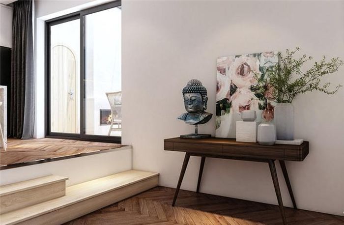 Bên cạnh đó, các yếu tố trang trí như tranh ảnh, bình hoa cũng được khéo léo đưa vào nhà.