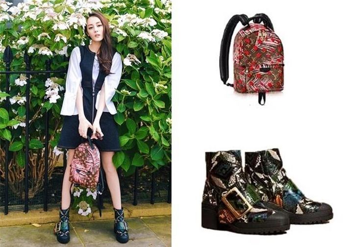 Người đẹp cho biết đam mê sưu tầm phụ kiện hàng hiệu. Trong ảnh cô tạo dáng với túi LV và bốt da rắn Burberry.