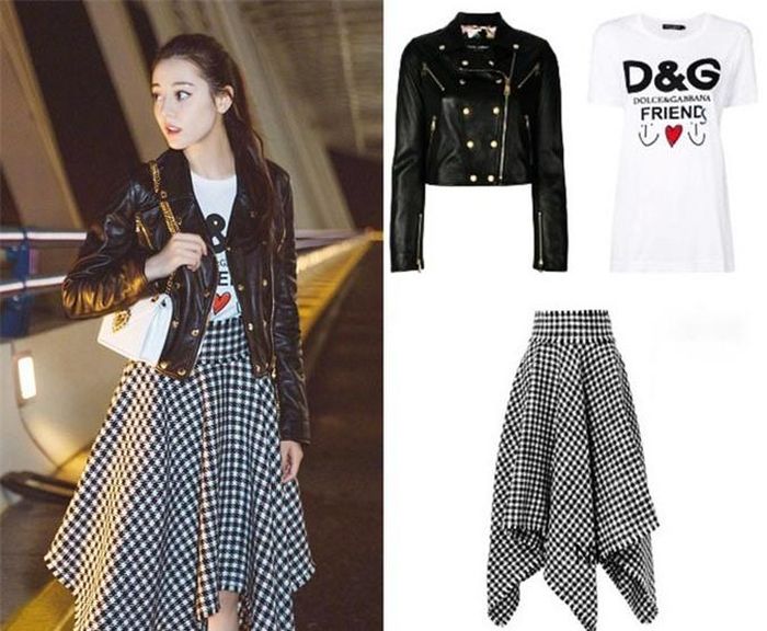 Địch Lệ Nhiệt Ba từng là đại sứ của Dolce & Gabbana, tuy nhiên cô hủy hợp tác với nhà mốt Italy vì hãng vướng scandal sỉ nhục Trung Quốc. Diễn viên hợp với Chic style - phong cách thời trang hướng đến sự thanh lịch, sang trọng. Trong ảnh, cô phối áo khoác da với áo thun và chân váy ca rô cách điệu của Dolce & Gabbana.