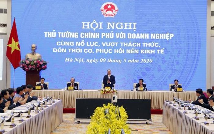 Thủ tướng Nguyễn Xuân Phúc và các Phó Thủ tướng chủ trì hội nghị tại điểm cầu Hà Nội. Ảnh: Thống Nhất – TTXVN