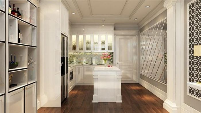 Bức tường kính phản chiếu ánh sáng, khiến phòng bếp trông rộng hơn so với diện tích thực tế.