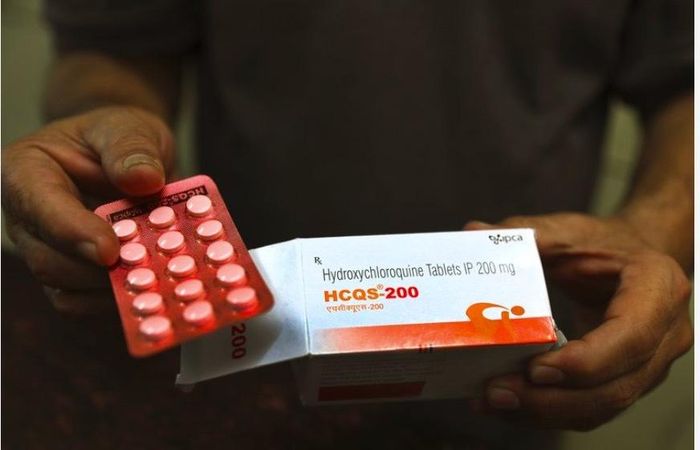  FDA quyết định hủy cấp phép sử dụng thuốc chống sốt rét để trị Covid-19. (Ảnh:AP)