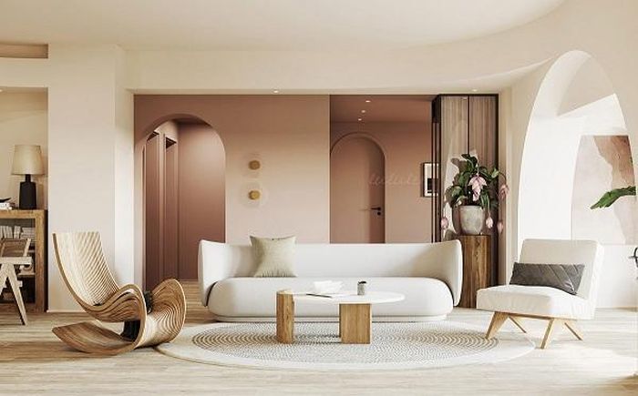 Đối với phòng khách này được thiết kế theo quy tắc đường cong. Một cổng vòm giống như cầu vồng là "chìa khóa" tạo thành một khung hình hoàn hảo.