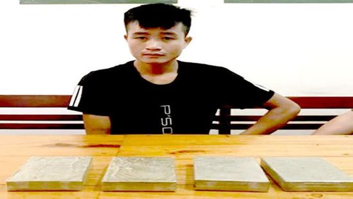Lô Văn Phạm cùng tang vật tại CQĐT (ảnh An Bình)