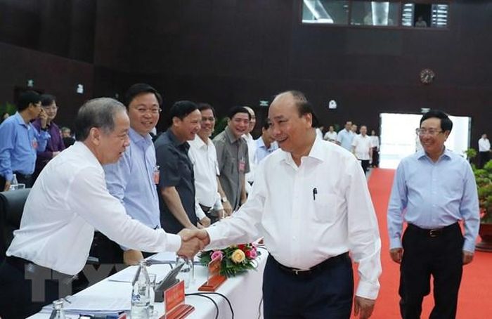 Thủ tướng Nguyễn Xuân Phúc với các đại biểu dự hội nghị. (Ảnh: Thống Nhất/TTXVN)