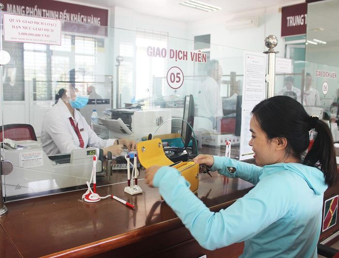 Đã có hơn 90% khách hàng cá nhân của Agribank-Chi nhánh thị xã An Khê là thành viên của tổ vay vốn. Ảnh: Sơn Ca
