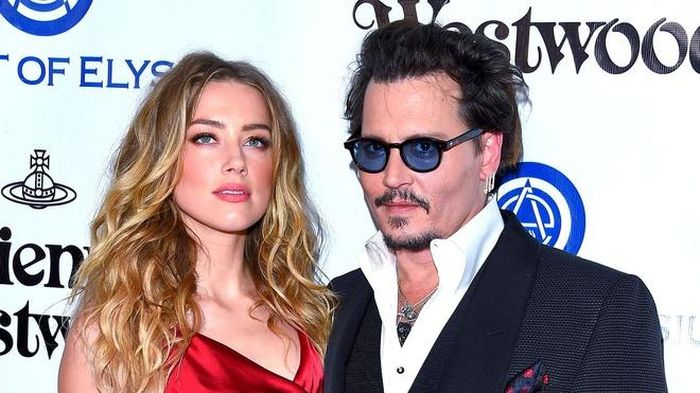  Johnny Depp và Amber Heard vẫn còn căng thẳng với nhau. Ảnh: NH. 