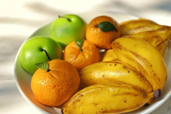 Nếu nhìn đĩa hoa quả với những trái quýt căng bóng, nải chuối chín vàng... có lẽ không ai ngờ rằng chúng chỉ là những chiếc bánh bao mềm dẻo
