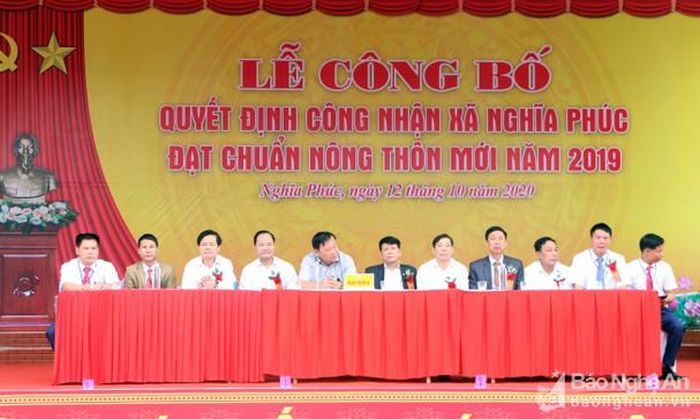 Các đại biểu về dự lễ công bố xã Nghĩa Phúc đạt chuẩn nông thôn mới. Ảnh: Như Lành