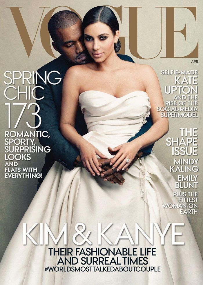  Năm 2014, Kim chính thức được công nhận là người có ảnh hưởng về thời trang khi cô và Kanye West cùng lên bìa tạp chí Vogue Mỹ. Cô mặc váy cưới do Alber Elbaz thiết kế cho Lanvin. Ảnh: Vogue. 