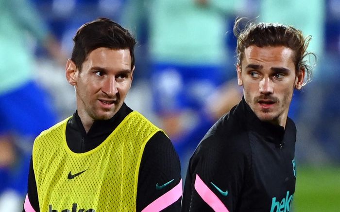 Messi là nguyên nhân khiến Griezmann trì trệ. Ảnh: Getty.