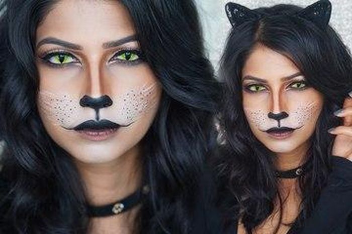 Cô mèo lạnh lùng, quyến rũ chỉ với một vài nét điểm xuyết bằng phấn trắng và bút đen. Đơn giản nhưng không hề nhàm chán.