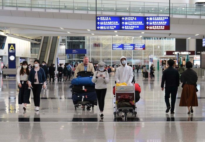 Các hoạt động tại sân bay ở Hong Kong vẫn diễn ra bình thường. Ảnh: China News