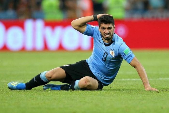 Suarez lỡ cơ hội đối đầu đội bóng cũ Barca vì nhiễm virus corona. Ảnh: Getty Images.