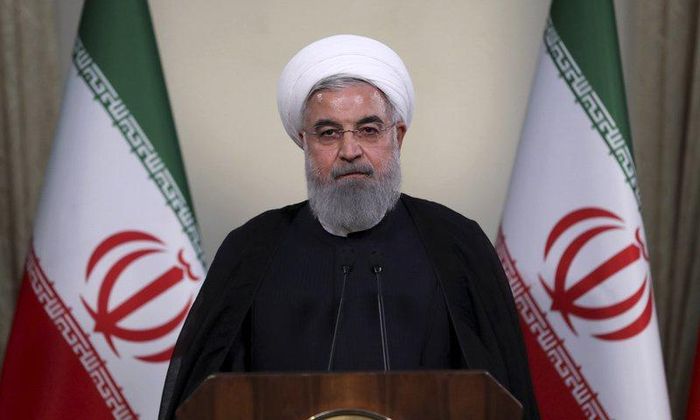  Tổng thống Iran Hassan Rouhani mong muốn chính phủ Mỹ quay lại với các cam kết quốc tế. Ảnh: AP. 