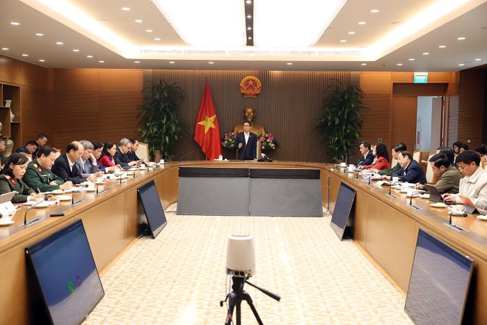 Phó Thủ tướng Vũ Đức Đam họp Thường trực Ban Chỉ đạo quốc gia phòng chống dịch bệnh COVID-19 ngay sau cuộc họp với Thủ tướng Nguyễn Xuân Phúc, sáng 28/1. Ảnh VGP
