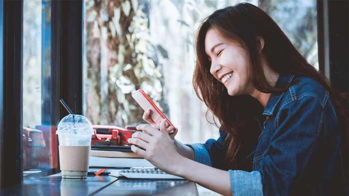 Phụ nữ cười duyên sẽ chiếm được trái tim đàn ông - Ảnh minh họa: Internet