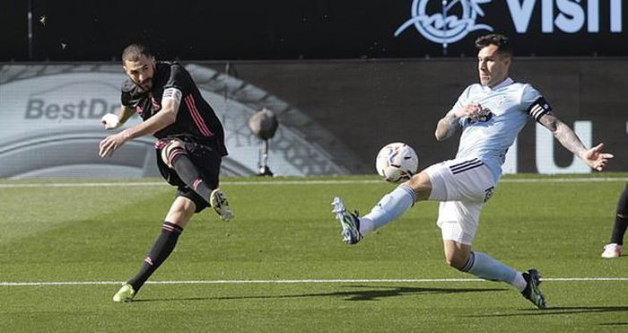 Benzema (trái) đang là thủ lĩnh trên hàng công của Real Madrid