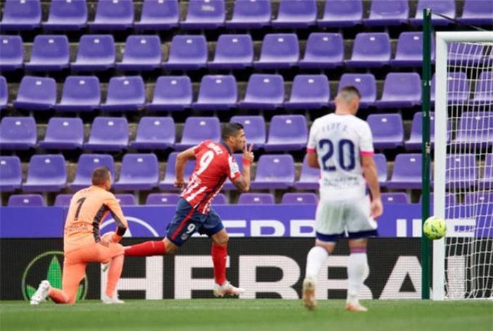 Suarez là người hùng của Atletico.
