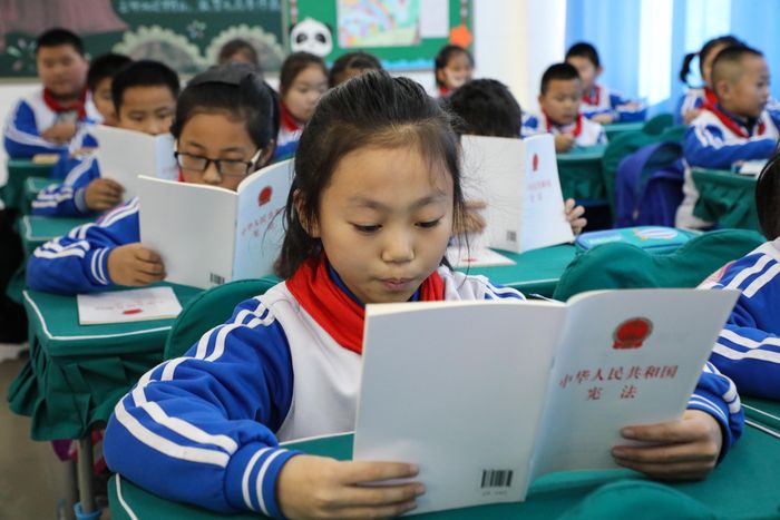 Trẻ em Trung Quốc chịu áp lực học hành nặng nề. Ảnh: Getty Images.