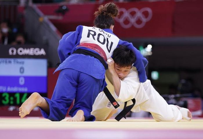 Thanh Thủy (áo trắng) dừng bước tại Olympic Tokyo.Ảnh: Reuters