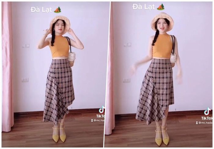 Lạc chân vào vùng đất mộng mơ Đà Lạt, Hà Đan hóa quý cô cổ điển với trang phục mang đậm chất vintage với tông vàng nâu ấm nóng. Với kiểu chân váy kẻ ô cầu kì, nữ BTV chọn kiểu áo tanktop cổ lọ đơn giản. Để tránh đi cái nắng dễ làm đen da của vùng đất cao nguyên này, không thể thiếu chiếc mũ rộng vành. 