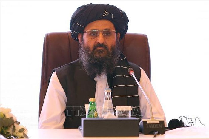Thủ lĩnh hàng đầu của Taliban Mullah Abdul Ghani Baradar trong cuộc đàm phán với đại diện Chính phủ Afghanistan ở Doha, Qatar ngày 18/7/2021. Ảnh: AFP/TTXVN