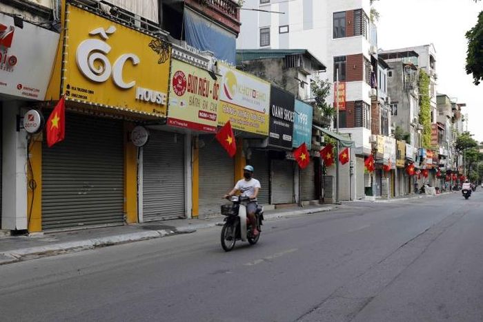 Phố Trương Định vắng vẻ ngày 2-9. Ảnh: Trần Việt - TTXVN