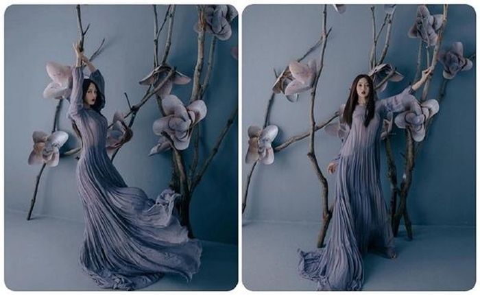 Trong chiếc đầm thướt tha màu xám tím, nữ ca sĩ xuất hiện trong hình ảnh đầy ma mị. Cô chọn tone son trầm, mái tóc buông dài toát lên vẻ sắc sảo trong bộ ảnh đón tuổi mới.