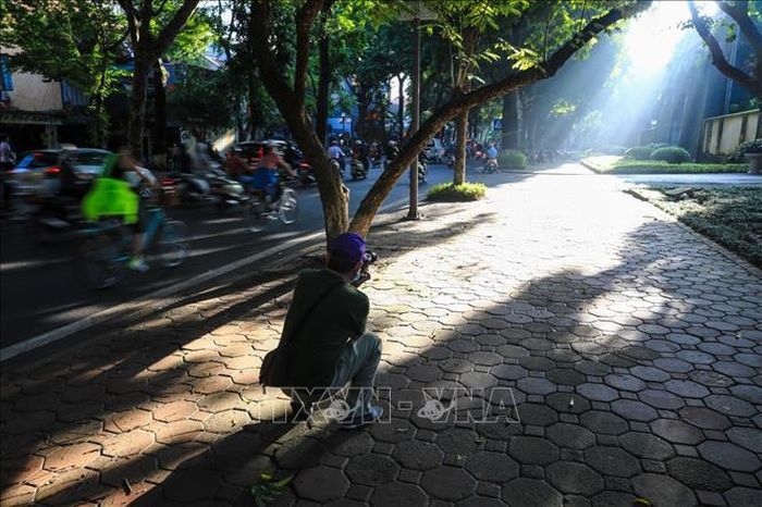 Đây là thời gian lý tưởng để các nhiếp ảnh gia ghi lại khoảnh khắc mùa thu của Hà Nội. Ảnh: Thành Đạt/TTXVN