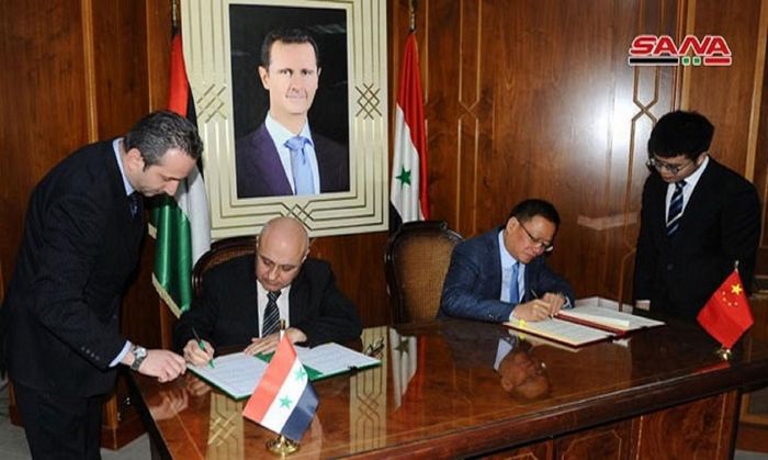 Lễ ký MoU về việc Syria tham gia Sáng kiến Vành đai và Con đường của Trung Quốc, ngày 12/1, tại Damascus, Syria.