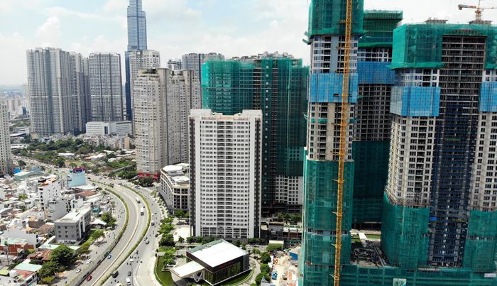  Thị trường bất động sản được dự báo tăng trưởng tích cực năm 2022 cũng kéo theo nhu cầu tuyển dụng nhân sự tăng cao. Ảnh: Quỳnh Danh. 