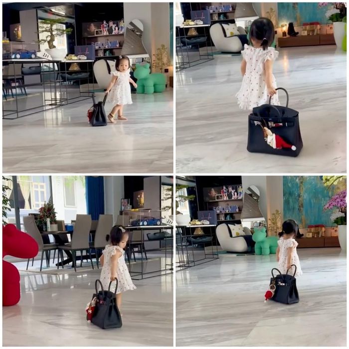 Suchin hào hứng kéo lê chiếc túi xách có giá trị lên đến 700 triệu đồng. Ảnh chụp màn hình