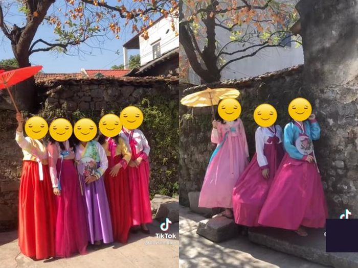 Nhiều bạn trẻ chọn mặc trang phục hanbok của Hàn Quốc để chụp ảnh với cây hồng 200 tuổi ở một ngôi làng cổ Việt.
