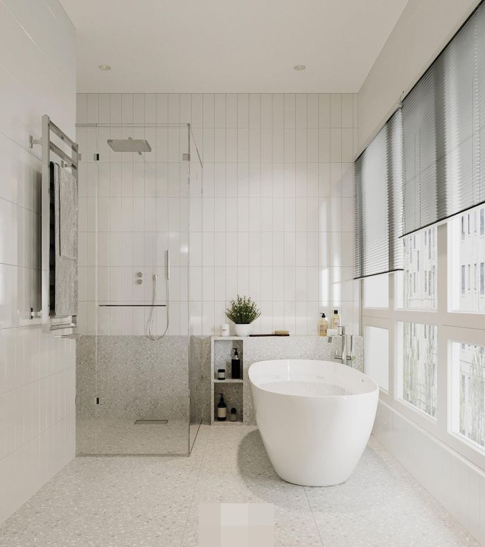Phòng tắm được thiết kế tối giản với điểm nhấn là chiếc gương mạ đồng mang đến vẻ đẹp sang trọng, tao nhã.